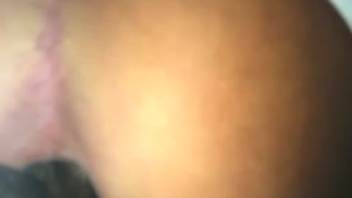 Detailed view of woman's defecating anus