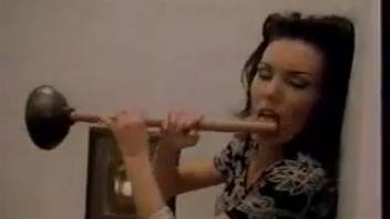 Chick shoves plunger up her own butt