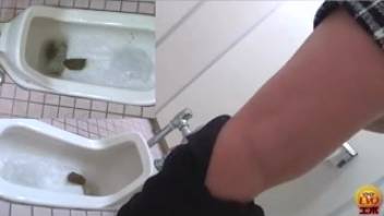 Female defecates in public restroom